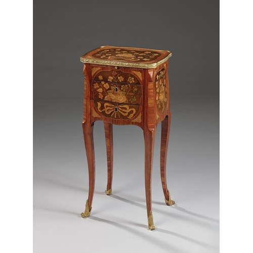 An ormolu mounted floral marquetry table en chiffonnière 